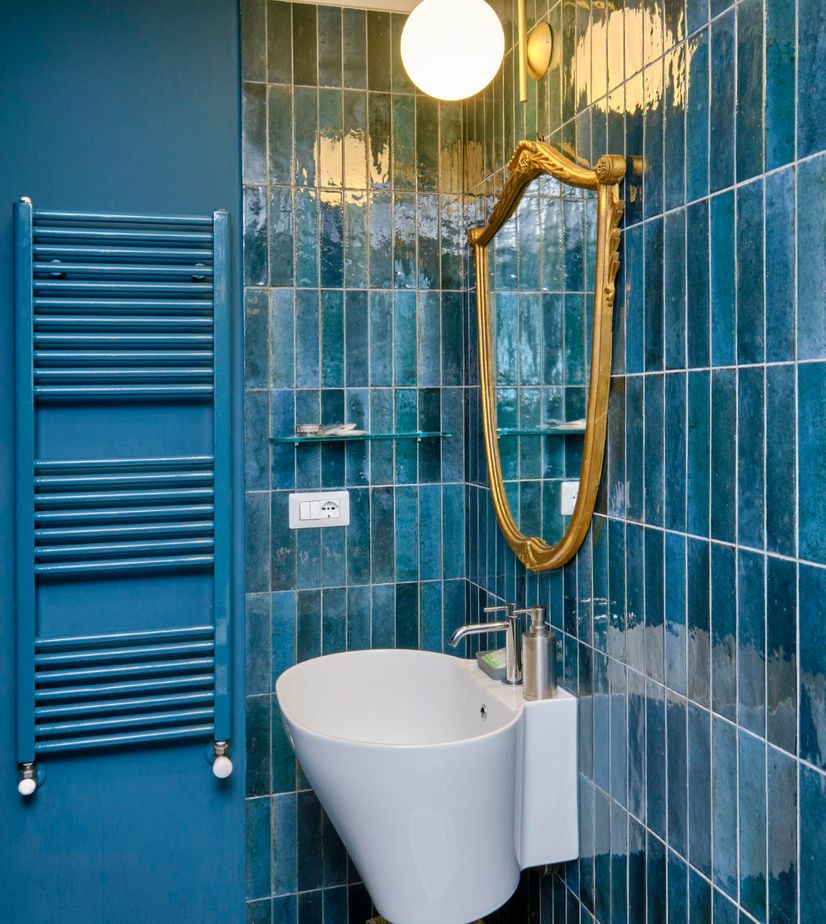 Blue tiled bathroom