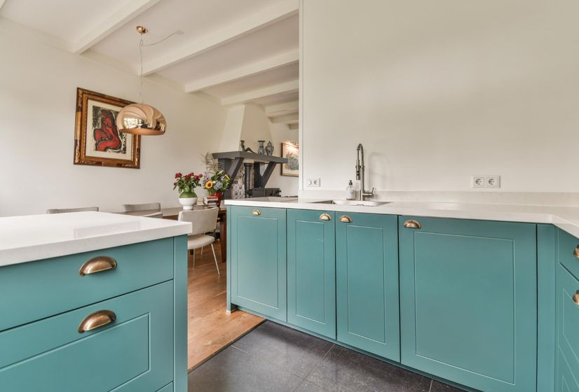 Teal cabinets in kitchen